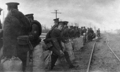 11th Reinforcement, New Zealand Expeditionary Force waiting for a train; Bestall (MBE) Leonard Delabere