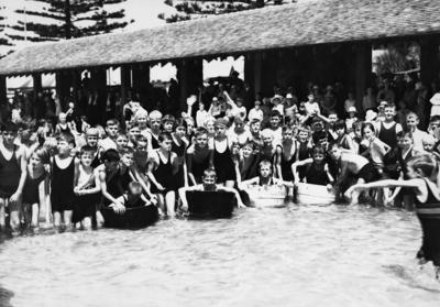 Children posing in the Napier paddling pool, Marine Parade
