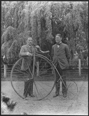 Sir Douglas Maclean and John Foster Fraser with penny farthing