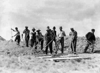 Men digging the mass grave at Park Island