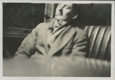 Percy Hamlin with eyes closed and pipe in his mouth; 2018/9/34/29