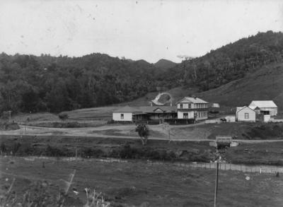 Unidentified cottage, homestead and outbuildings, New Zealand
