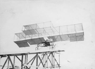 Plane on ramp; Ogilvie, Bertram