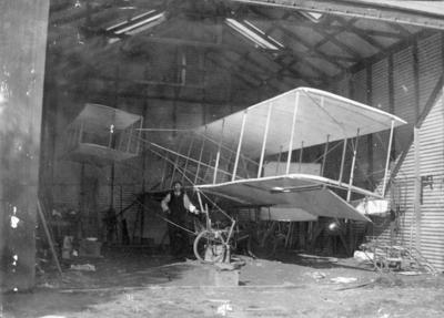 Plane in Hangar; Ogilvie, Bertram
